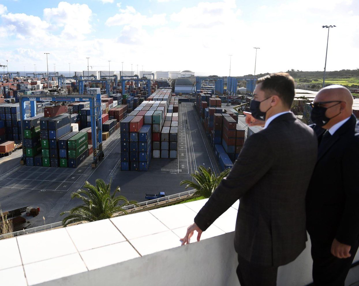 Minister Schembri looking over Malta Freeport